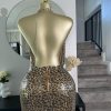 Snake print open back mini dress